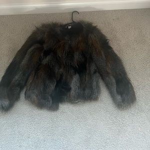 Faux fur size US 10 coat great fit especially with jeans. brown,gray and black